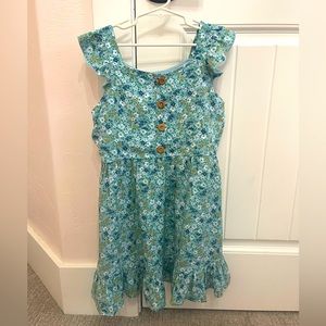 Sundress Brand is Zunie, size is a girls S 7/8